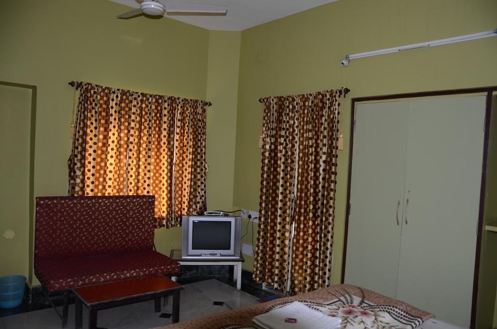 Kim Lawn Guest House Calcutta Værelse billede